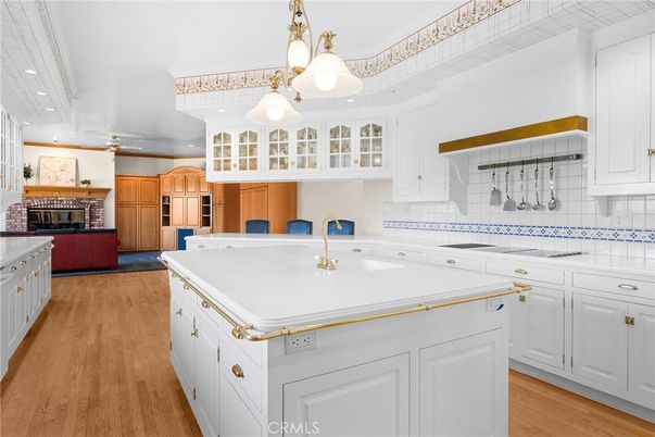 Interior, Kitchen, Pendant Lights, Recessed Lighting, Tile Countertops, Wood Texture Flooring