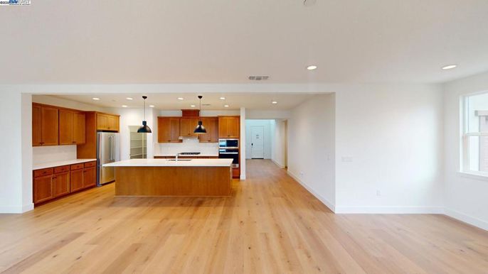 Interior, Kitchen, Pendant Lights, Recessed Lighting, Stainless Steel Appliances, Wood Texture Flooring