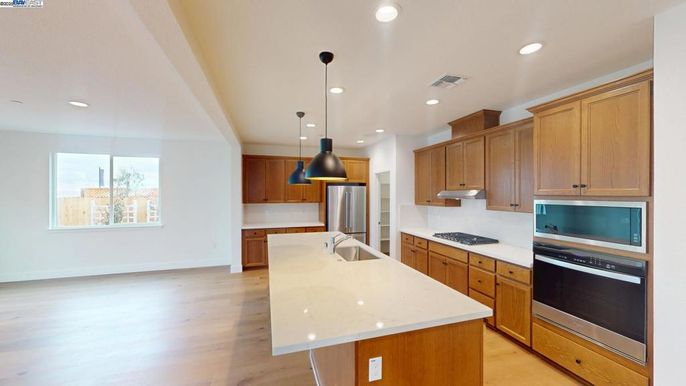 Interior, Kitchen, Pendant Lights, Recessed Lighting, Stainless Steel Appliances, Wood Texture Flooring