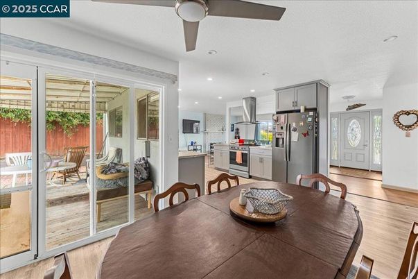 Dining room, Interior, Kitchen, Recessed Lighting, Stainless Steel Appliances, Wood Texture Flooring