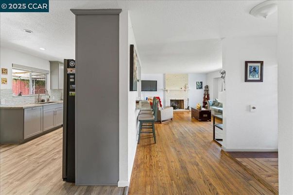 Fireplace, Interior, Kitchen, Living room, Recessed Lighting, Wood Texture Flooring