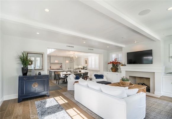 Chandelier, Dining room, Fireplace, Interior, Kitchen, Living room, Recessed Lighting, Wood Texture Flooring