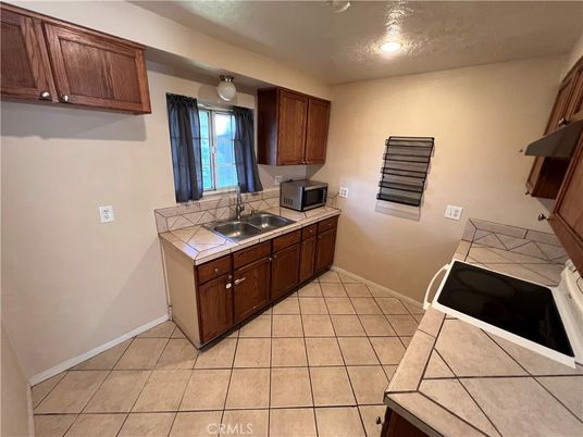 Interior, Kitchen, Recessed Lighting, Tile Countertops