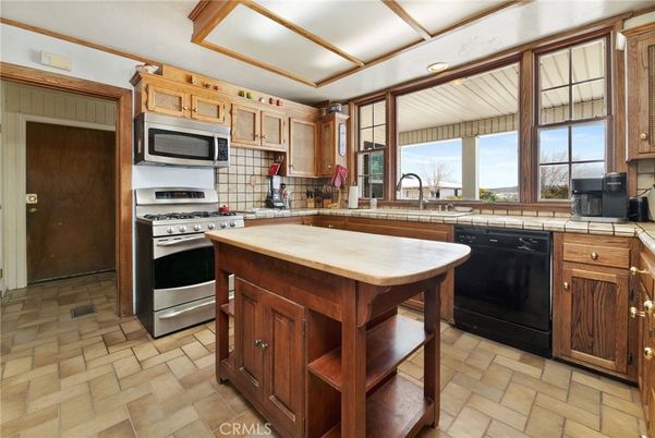 Interior, Kitchen, Recessed Lighting, Stainless Steel Appliances, Tile Countertops