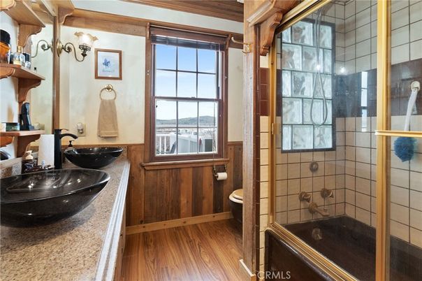 Bathroom, Dual Sink Vanities, Glass Shower, Interior, Wood Texture Flooring