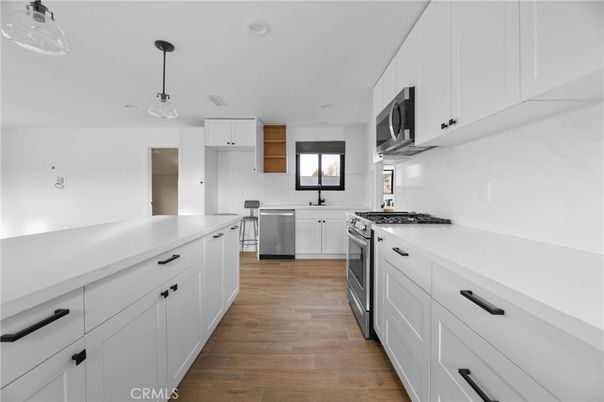 Interior, Kitchen, Pendant Lights, Recessed Lighting, Stainless Steel Appliances, Wood Texture Flooring