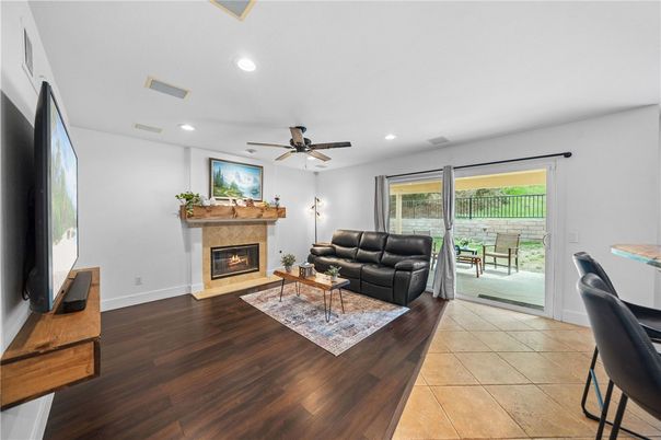 Fireplace, Interior, Living room, Recessed Lighting, Wood Texture Flooring