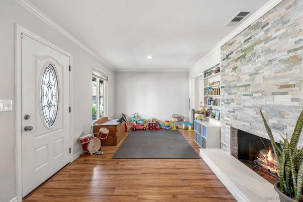 Fireplace, Interior, Recessed Lighting, Stone Walls, Wood Texture Flooring
