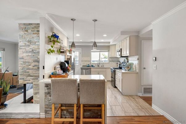 Interior, Kitchen, Pendant Lights, Recessed Lighting, Stainless Steel Appliances, Stone Walls, Wood Texture Flooring