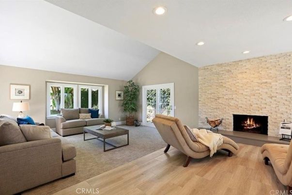 Fireplace, Interior, Living room, Recessed Lighting, Stone Walls, Wood Texture Flooring