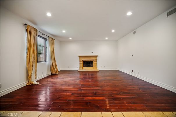 Empty room, Fireplace, Interior, Recessed Lighting, Wood Texture Flooring