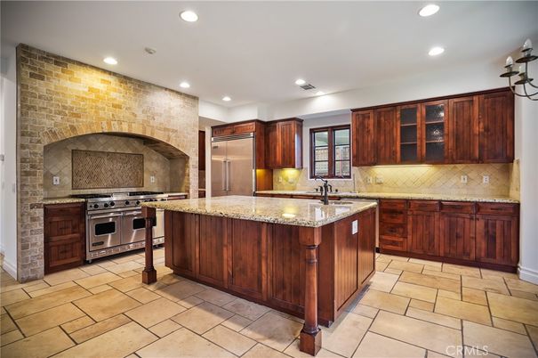 Interior, Kitchen, Recessed Lighting, Stainless Steel Appliances, Stone Walls