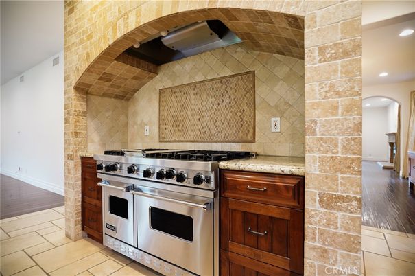 Interior, Kitchen, Recessed Lighting, Stainless Steel Appliances, Stone Walls, Wood Texture Flooring