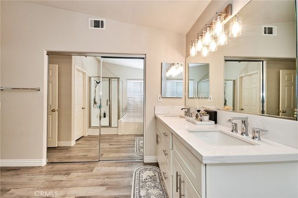 Bathroom, Dual Sink Vanities, Glass Shower, Interior, Wood Texture Flooring