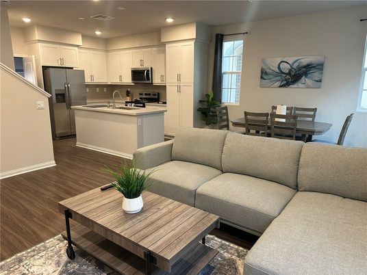 Dining room, Interior, Kitchen, Living room, Recessed Lighting, Stainless Steel Appliances, Wood Texture Flooring