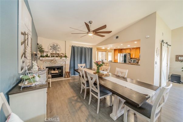 Dining room, Fireplace, Interior, Kitchen, Recessed Lighting, Wood Texture Flooring