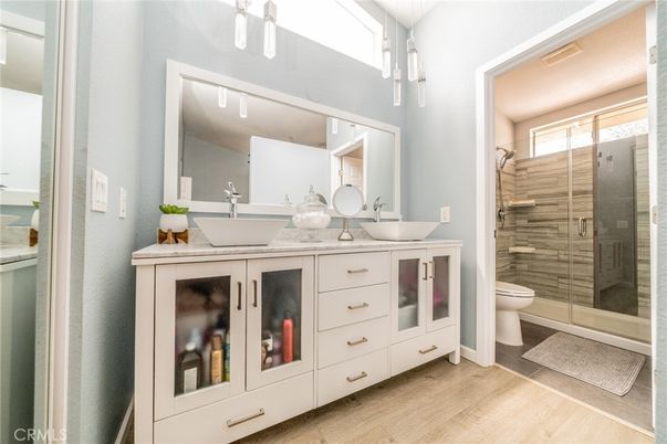 Bathroom, Dual Sink Vanities, Glass Shower, Interior, Wood Texture Flooring