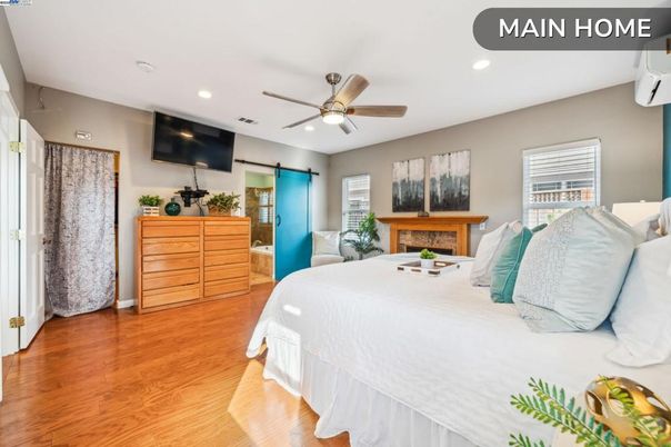 Bedroom, Fireplace, Interior, Recessed Lighting, Wood Texture Flooring
