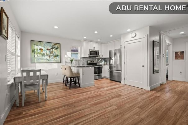 Dining room, Interior, Kitchen, Recessed Lighting, Stainless Steel Appliances, Wood Texture Flooring