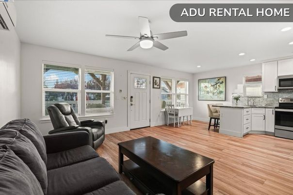 Dining room, Interior, Kitchen, Living room, Recessed Lighting, Stainless Steel Appliances, Wood Texture Flooring