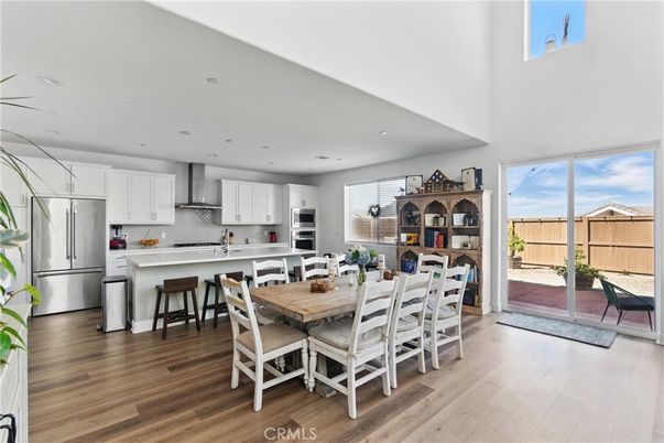 Dining room, Interior, Kitchen, Recessed Lighting, Stainless Steel Appliances, Wood Texture Flooring