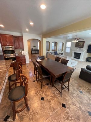 Dining room, Fireplace, Interior, Kitchen, Recessed Lighting, Stainless Steel Appliances