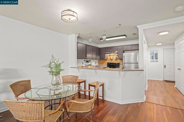 Dining room, Interior, Kitchen, Recessed Lighting, Stainless Steel Appliances, Wood Texture Flooring