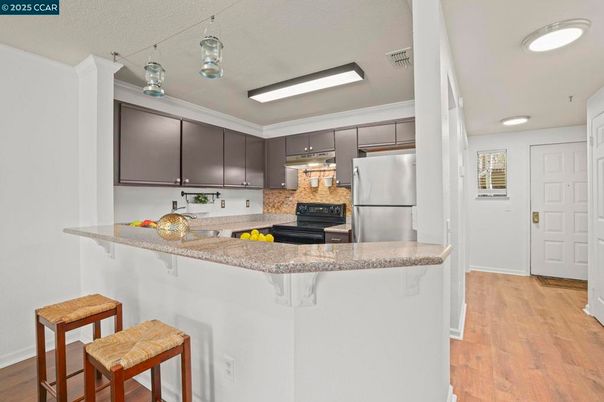 Interior, Kitchen, Recessed Lighting, Stainless Steel Appliances, Wood Texture Flooring