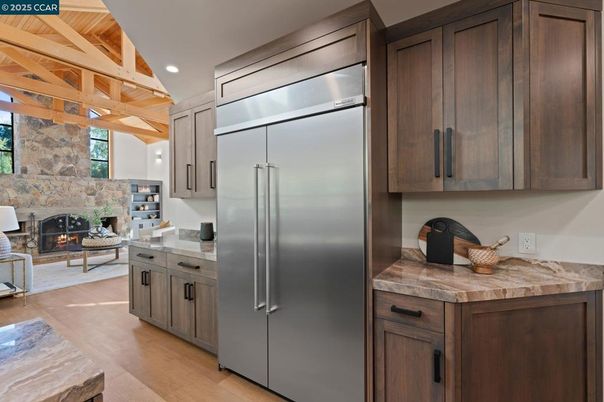 Fireplace, Interior, Kitchen, Living room, Recessed Lighting, Stainless Steel Appliances, Stone Walls, Wooden Beams, Wooden Ceilings, Wood Texture Flooring