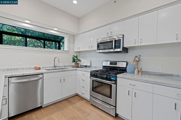 Interior, Kitchen, Recessed Lighting, Stainless Steel Appliances, Wood Texture Flooring