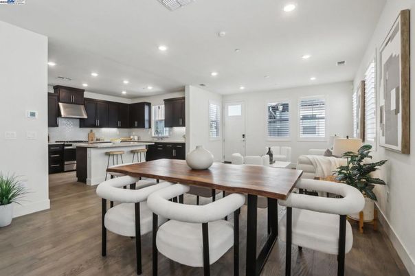 Dining room, Interior, Kitchen, Recessed Lighting, Stainless Steel Appliances, Wood Texture Flooring