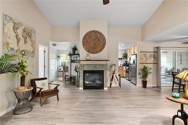Fireplace, Interior, Kitchen, Recessed Lighting, Stainless Steel Appliances, Wood Texture Flooring