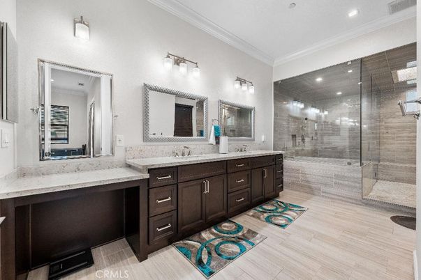Bathroom, Dual Sink Vanities, Glass Shower, Interior, Recessed Lighting, Wood Texture Flooring