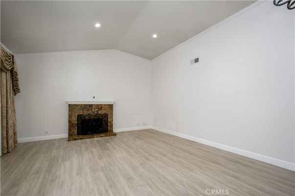 Empty room, Fireplace, Interior, Recessed Lighting, Wood Texture Flooring