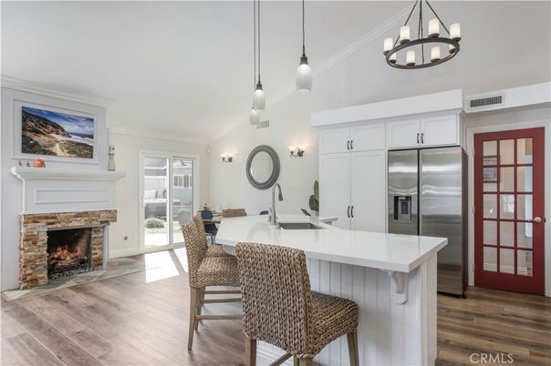 Fireplace, Interior, Kitchen, Pendant Lights, Stainless Steel Appliances, Wood Texture Flooring