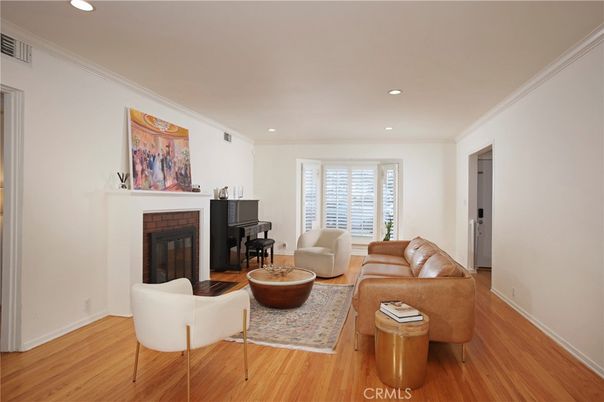 Fireplace, Interior, Living room, Piano, Recessed Lighting, Wood Texture Flooring