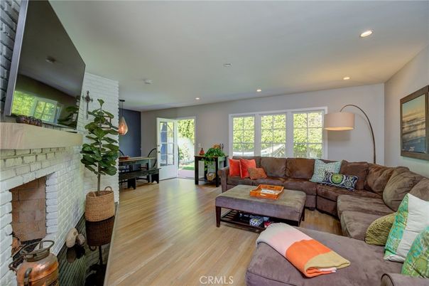 Fireplace, Interior, Living room, Piano, Recessed Lighting, Wood Texture Flooring