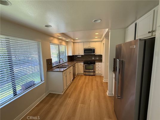 Interior, Kitchen, Recessed Lighting, Stainless Steel Appliances, Wood Texture Flooring
