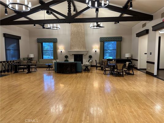 Chandelier, Dining room, Fireplace, Interior, Living room, Pendant Lights, Wood Texture Flooring