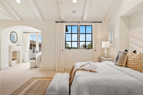 Bedroom, Fireplace, Interior, Recessed Lighting, Water, Wooden Beams
