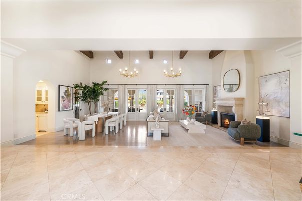 Chandelier, Dining room, Fireplace, Interior, Living room, Pendant Lights, Recessed Lighting, Wooden Beams