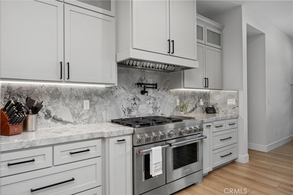 Interior, Kitchen, Marble Walls, Stainless Steel Appliances, Wood Texture Flooring
