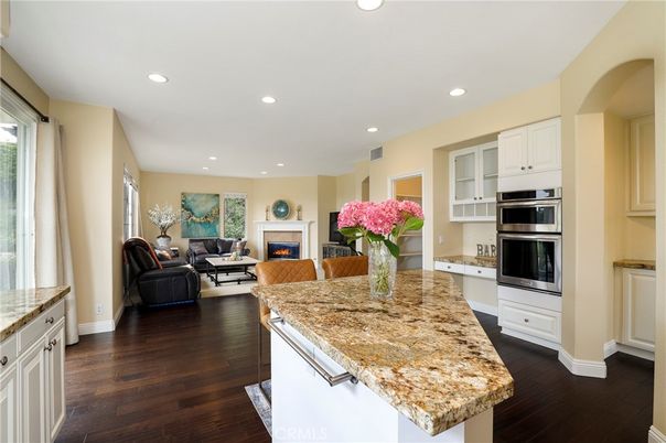 Fireplace, Interior, Kitchen, Living room, Recessed Lighting, Stainless Steel Appliances, Wood Texture Flooring
