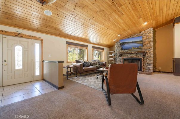 Fireplace, Interior, Living room, Recessed Lighting, Stone Walls, Wooden Ceilings