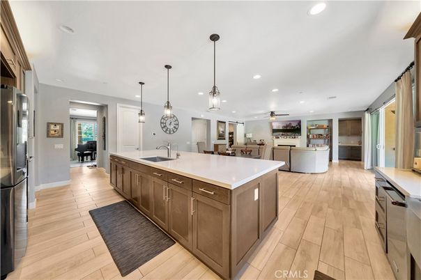 Dining room, Interior, Kitchen, Living room, Pendant Lights, Recessed Lighting, Stainless Steel Appliances, Wood Texture Flooring