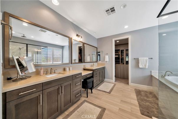 Bathroom, Dual Sink Vanities, Interior, Recessed Lighting, Walk-in Closets, Wood Texture Flooring