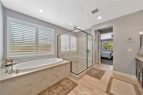 Bathroom, Bedroom, Glass Shower, Interior, Recessed Lighting, Wood Texture Flooring