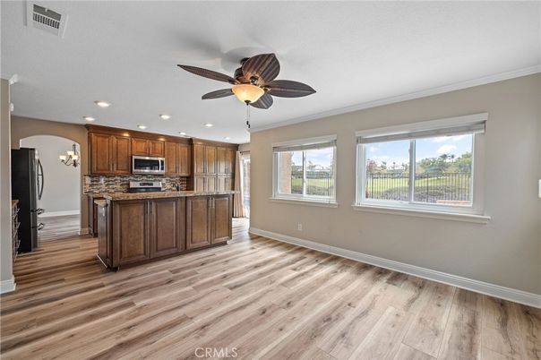 Chandelier, Interior, Kitchen, Recessed Lighting, Stainless Steel Appliances, Wood Texture Flooring
