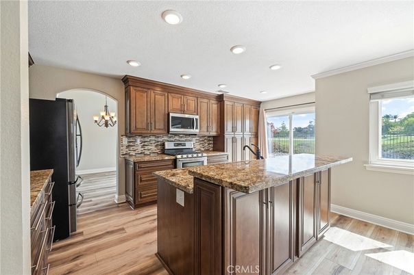 Chandelier, Interior, Kitchen, Recessed Lighting, Stainless Steel Appliances, Wood Texture Flooring