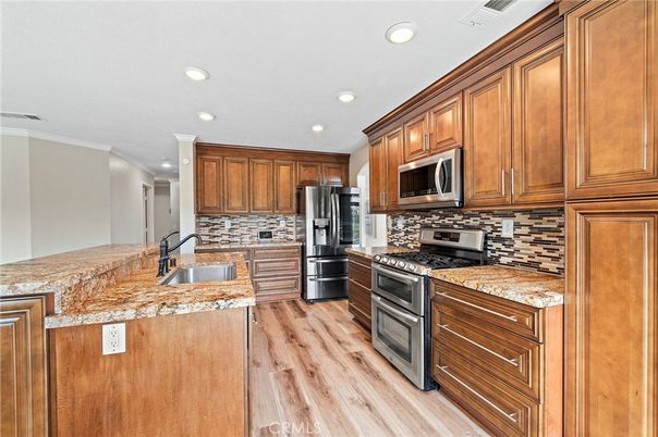 Interior, Kitchen, Recessed Lighting, Stainless Steel Appliances, Wood Texture Flooring